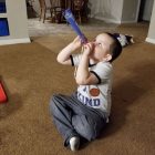 child enjoying outer space discovery box