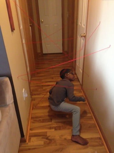 dodging under hallway laser maze