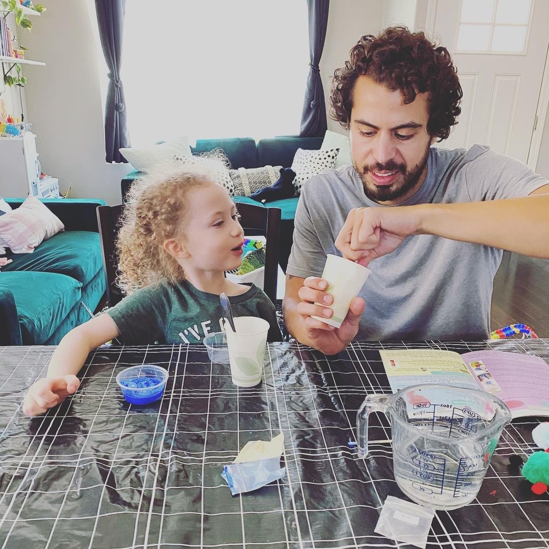 daddy and son tandem experimenting the chemistry set for kids
