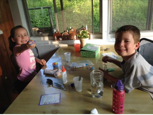 kids having fun with slime monsters experiment