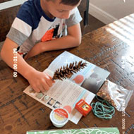 kid learning STEM kits at home